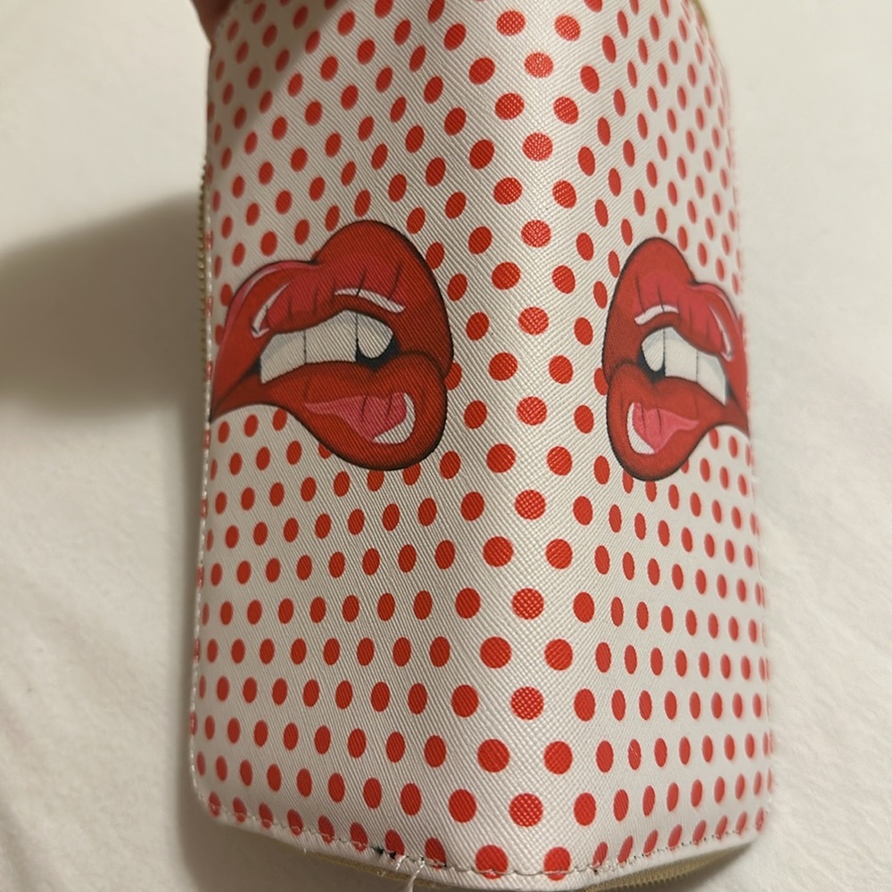 Red polka dot wallet zip around. Reminds me of Rolling Stones Album Cover. - Picture 4 of 8